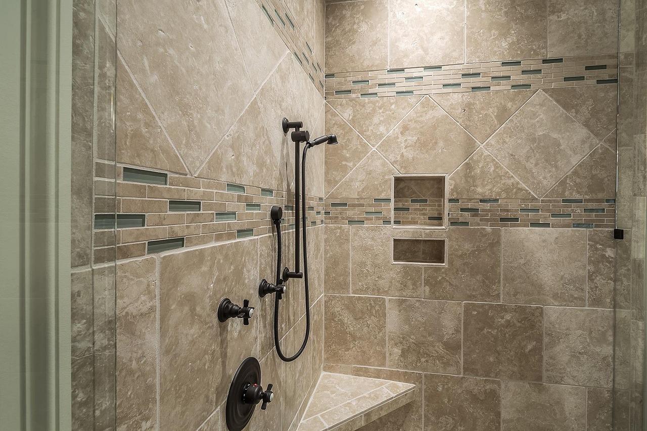 Shower tile ideas with contrasting floor and wall tile